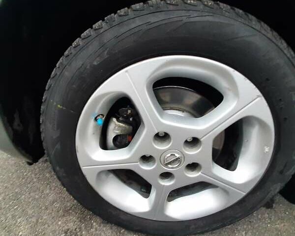 Серый Ниссан Лиф, объемом двигателя 0 л и пробегом 129 тыс. км за 7100 $, фото 16 на Automoto.ua