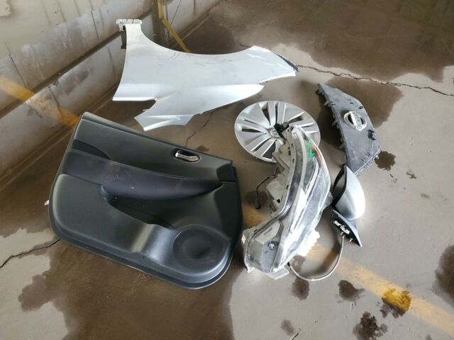 Серый Ниссан Лиф, объемом двигателя 0 л и пробегом 62 тыс. км за 8500 $, фото 11 на Automoto.ua