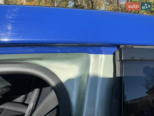 Синий Ниссан Лиф, объемом двигателя 0 л и пробегом 164 тыс. км за 13200 $, фото 19 на Automoto.ua