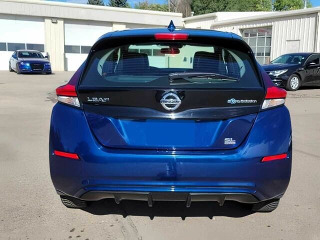 Синий Ниссан Лиф, объемом двигателя 0 л и пробегом 42 тыс. км за 6400 $, фото 5 на Automoto.ua