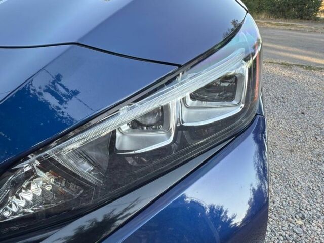 Синий Ниссан Лиф, объемом двигателя 0 л и пробегом 77 тыс. км за 19000 $, фото 2 на Automoto.ua