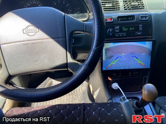 Белый Ниссан Максима, объемом двигателя 2 л и пробегом 510 тыс. км за 2750 $, фото 3 на Automoto.ua