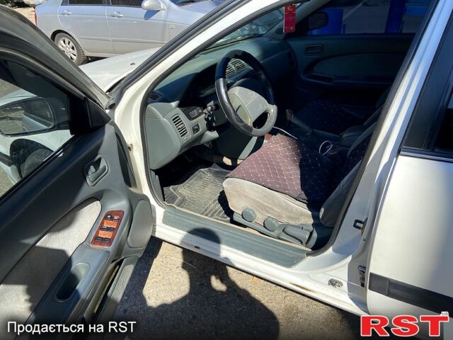 Белый Ниссан Максима, объемом двигателя 2 л и пробегом 510 тыс. км за 2750 $, фото 2 на Automoto.ua