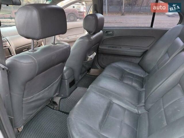 Белый Ниссан Максима, объемом двигателя 3 л и пробегом 454 тыс. км за 3100 $, фото 16 на Automoto.ua