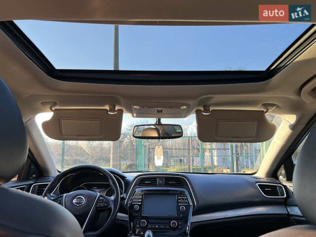 Белый Ниссан Максима, объемом двигателя 3.5 л и пробегом 207 тыс. км за 13700 $, фото 8 на Automoto.ua