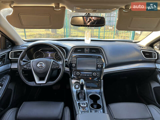 Белый Ниссан Максима, объемом двигателя 3.5 л и пробегом 207 тыс. км за 13700 $, фото 6 на Automoto.ua