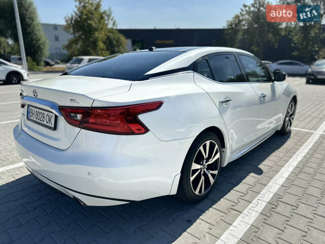 Белый Ниссан Максима, объемом двигателя 3.5 л и пробегом 206 тыс. км за 12200 $, фото 3 на Automoto.ua