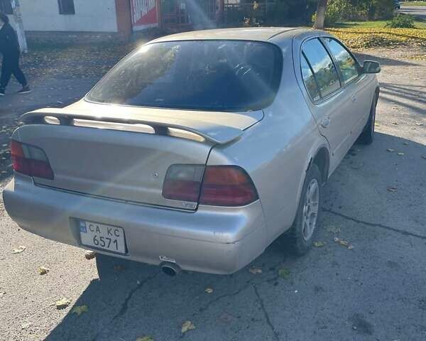 Бежевый Ниссан Максима, объемом двигателя 3 л и пробегом 400 тыс. км за 1900 $, фото 2 на Automoto.ua