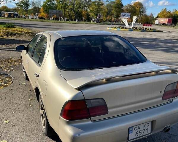 Бежевый Ниссан Максима, объемом двигателя 3 л и пробегом 400 тыс. км за 1900 $, фото 1 на Automoto.ua