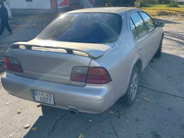 Бежевый Ниссан Максима, объемом двигателя 3 л и пробегом 400 тыс. км за 1900 $, фото 3 на Automoto.ua