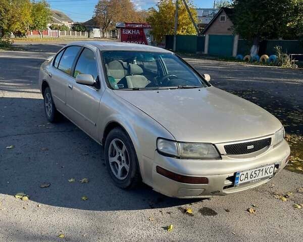 Бежевый Ниссан Максима, объемом двигателя 3 л и пробегом 400 тыс. км за 1900 $, фото 5 на Automoto.ua