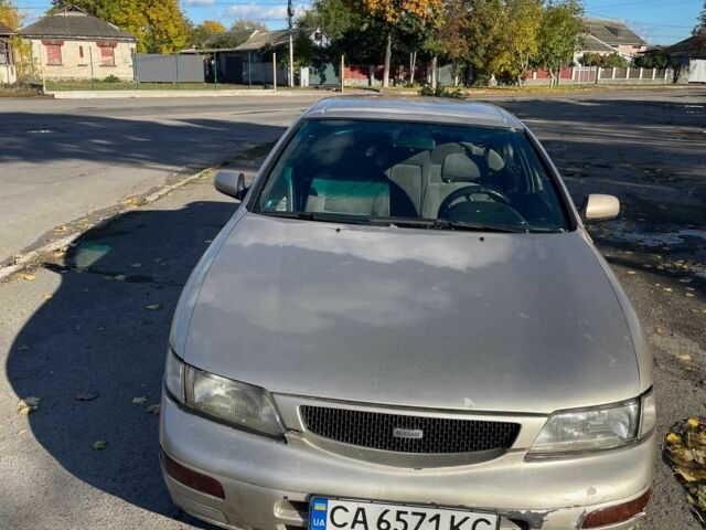 Бежевый Ниссан Максима, объемом двигателя 3 л и пробегом 400 тыс. км за 1900 $, фото 1 на Automoto.ua