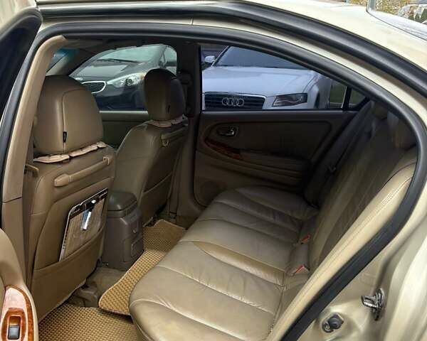 Бежевый Ниссан Максима, объемом двигателя 2.99 л и пробегом 290 тыс. км за 4300 $, фото 5 на Automoto.ua