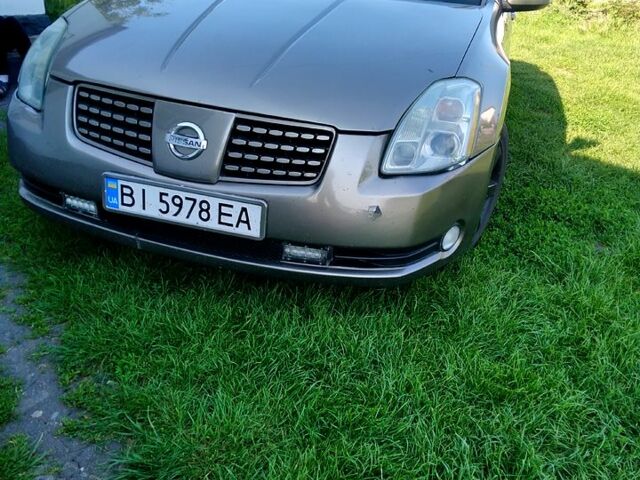 Бежевый Ниссан Максима, объемом двигателя 3.5 л и пробегом 320 тыс. км за 4500 $, фото 2 на Automoto.ua