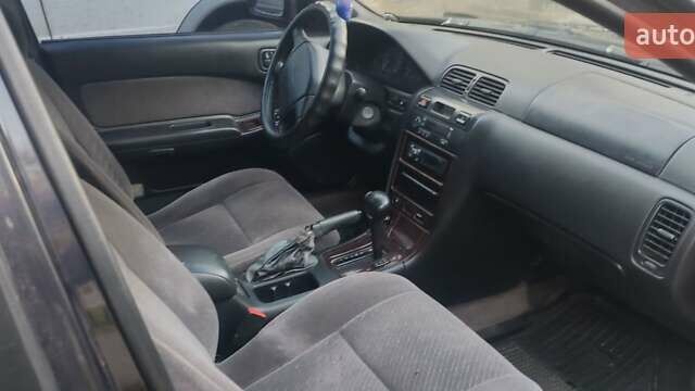 Ніссан Максіма 1995 у Черкасах на Automoto.ua Чорний Ніссан Максіма, об'ємом двигуна 2 л та пробігом 274 тис. км за 1999 $, фото 9 на Automoto.ua