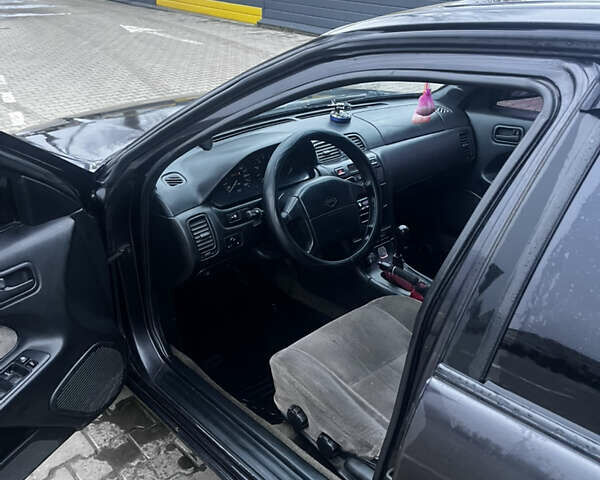 Черный Ниссан Максима, объемом двигателя 2 л и пробегом 450 тыс. км за 2250 $, фото 9 на Automoto.ua