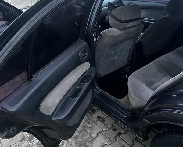 Черный Ниссан Максима, объемом двигателя 2 л и пробегом 450 тыс. км за 2250 $, фото 4 на Automoto.ua