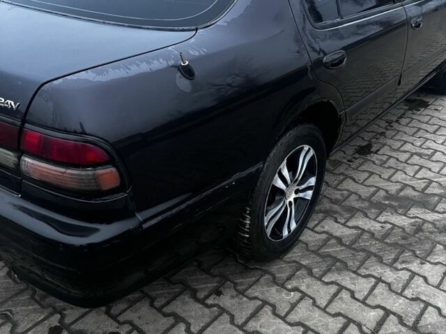 Черный Ниссан Максима, объемом двигателя 2 л и пробегом 450 тыс. км за 2250 $, фото 3 на Automoto.ua