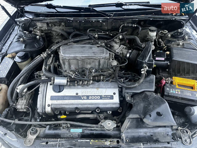 Черный Ниссан Максима, объемом двигателя 2 л и пробегом 450 тыс. км за 2250 $, фото 8 на Automoto.ua