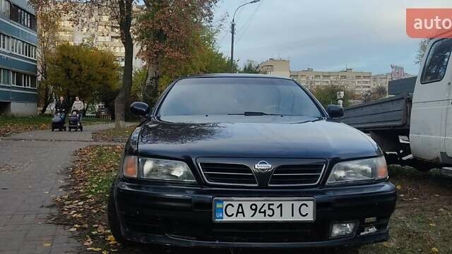 Ніссан Максіма 1995 у Черкасах на Automoto.ua Чорний Ніссан Максіма, об'ємом двигуна 2 л та пробігом 274 тис. км за 1999 $, фото 4 на Automoto.ua