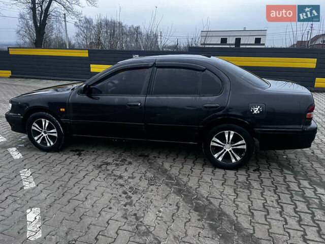 Черный Ниссан Максима, объемом двигателя 2 л и пробегом 450 тыс. км за 2250 $, фото 6 на Automoto.ua