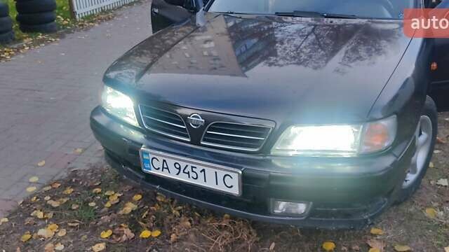 Ніссан Максіма 1995 у Черкасах на Automoto.ua Чорний Ніссан Максіма, об'ємом двигуна 2 л та пробігом 274 тис. км за 1999 $, фото 12 на Automoto.ua