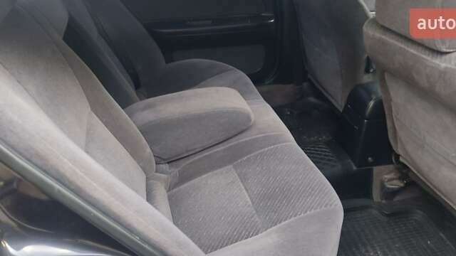 Ніссан Максіма 1995 у Черкасах на Automoto.ua Чорний Ніссан Максіма, об'ємом двигуна 2 л та пробігом 274 тис. км за 1999 $, фото 7 на Automoto.ua