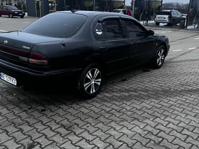 Черный Ниссан Максима, объемом двигателя 2 л и пробегом 450 тыс. км за 2250 $, фото 2 на Automoto.ua