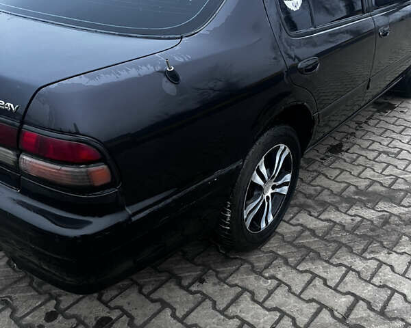 Черный Ниссан Максима, объемом двигателя 2 л и пробегом 450 тыс. км за 2250 $, фото 11 на Automoto.ua