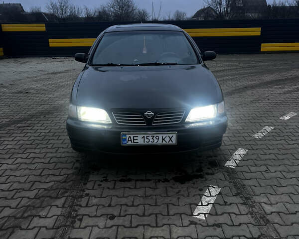 Черный Ниссан Максима, объемом двигателя 2 л и пробегом 450 тыс. км за 2250 $, фото 1 на Automoto.ua