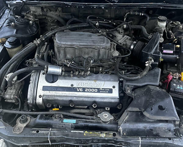 Черный Ниссан Максима, объемом двигателя 2 л и пробегом 450 тыс. км за 2250 $, фото 2 на Automoto.ua