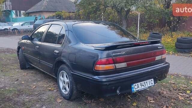 Ніссан Максіма 1995 у Черкасах на Automoto.ua Чорний Ніссан Максіма, об'ємом двигуна 2 л та пробігом 274 тис. км за 1999 $, фото 11 на Automoto.ua