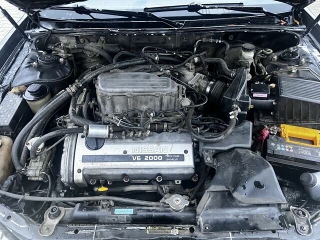 Черный Ниссан Максима, объемом двигателя 2 л и пробегом 450 тыс. км за 2250 $, фото 1 на Automoto.ua