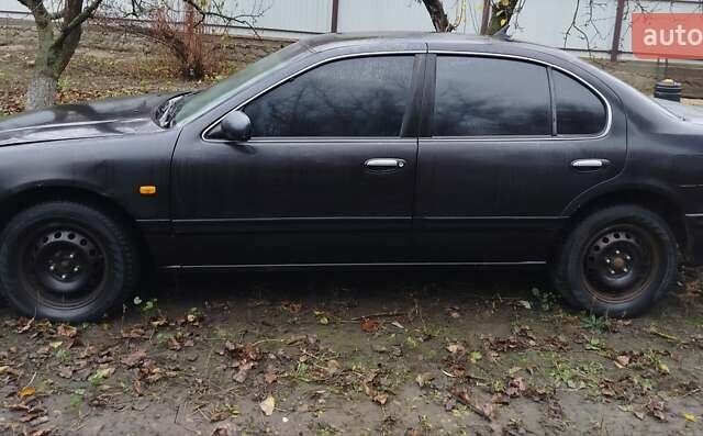 Черный Ниссан Максима, объемом двигателя 2 л и пробегом 34 тыс. км за 1650 $, фото 2 на Automoto.ua