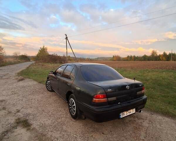 Чорний Ніссан Максіма, об'ємом двигуна 2 л та пробігом 290 тис. км за 1500 $, фото 3 на Automoto.ua