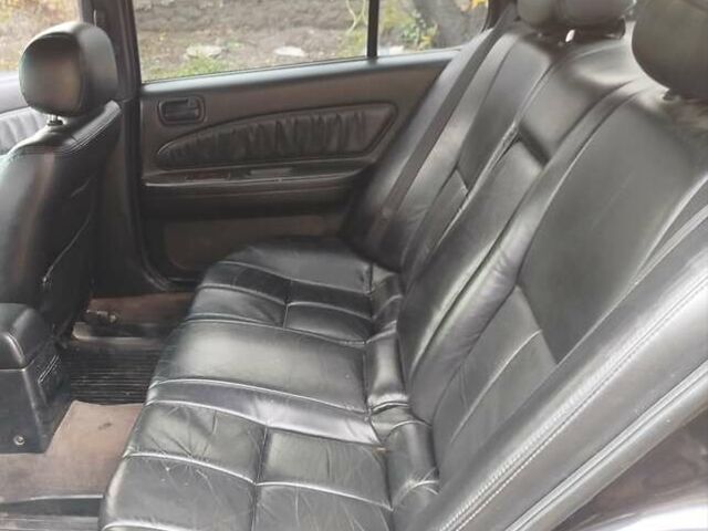 Черный Ниссан Максима, объемом двигателя 2 л и пробегом 34 тыс. км за 1650 $, фото 3 на Automoto.ua