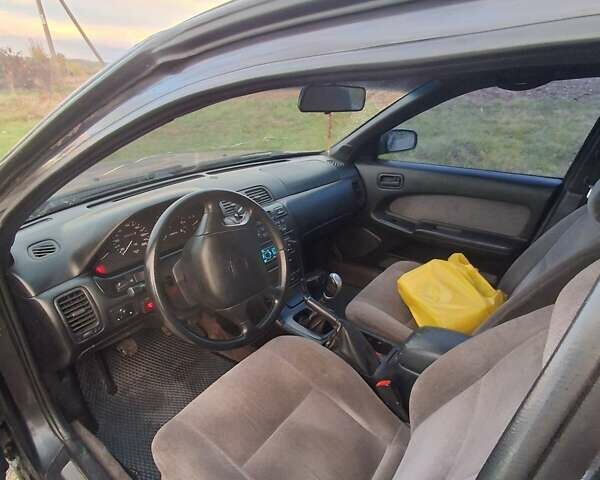 Чорний Ніссан Максіма, об'ємом двигуна 2 л та пробігом 290 тис. км за 1500 $, фото 6 на Automoto.ua