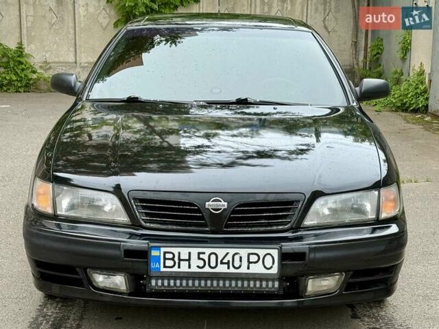 Черный Ниссан Максима, объемом двигателя 2 л и пробегом 302 тыс. км за 1999 $, фото 1 на Automoto.ua