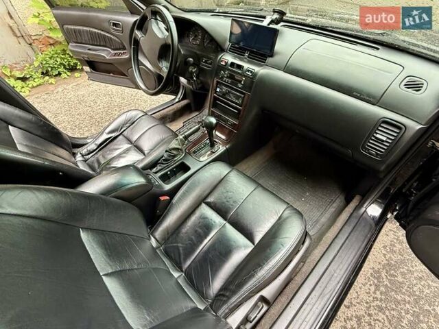 Черный Ниссан Максима, объемом двигателя 2 л и пробегом 302 тыс. км за 1999 $, фото 21 на Automoto.ua