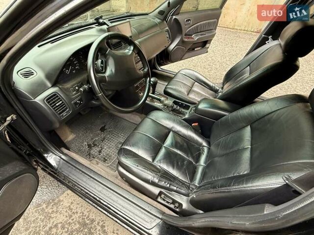 Черный Ниссан Максима, объемом двигателя 2 л и пробегом 302 тыс. км за 1999 $, фото 36 на Automoto.ua