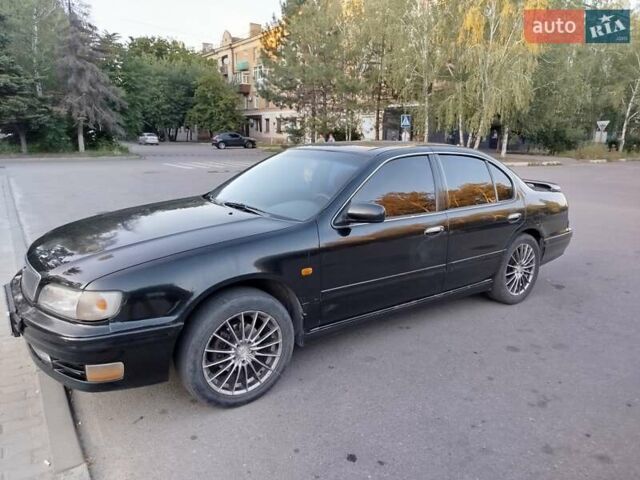 Чорний Ніссан Максіма, об'ємом двигуна 3 л та пробігом 403 тис. км за 2500 $, фото 1 на Automoto.ua
