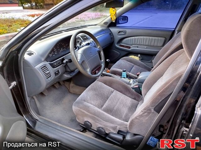 Черный Ниссан Максима, объемом двигателя 3 л и пробегом 403 тыс. км за 2500 $, фото 2 на Automoto.ua
