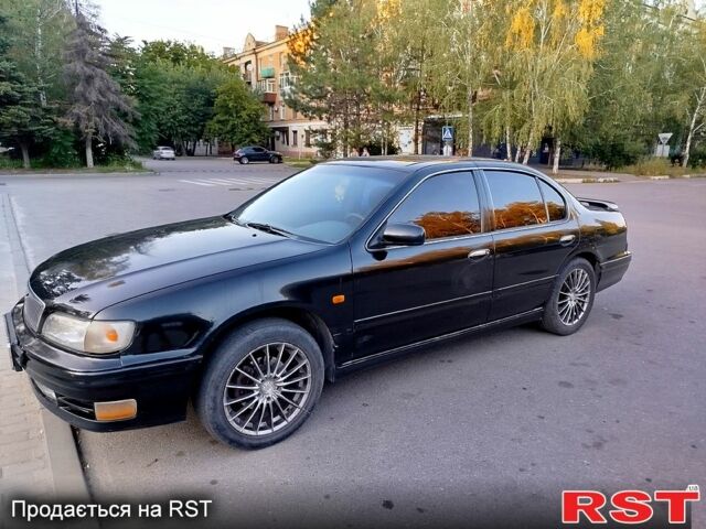Черный Ниссан Максима, объемом двигателя 3 л и пробегом 403 тыс. км за 2500 $, фото 1 на Automoto.ua