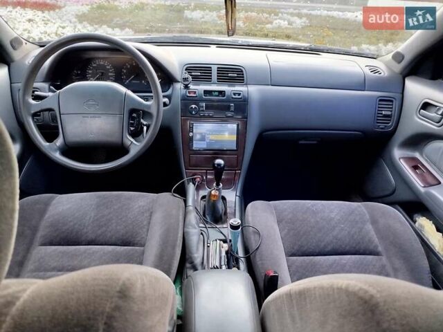 Чорний Ніссан Максіма, об'ємом двигуна 3 л та пробігом 403 тис. км за 2500 $, фото 4 на Automoto.ua