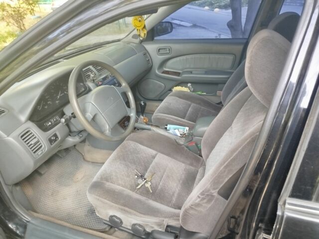 Черный Ниссан Максима, объемом двигателя 3 л и пробегом 403 тыс. км за 2500 $, фото 1 на Automoto.ua