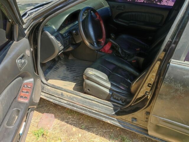 Чорний Ніссан Максіма, об'ємом двигуна 2 л та пробігом 416 тис. км за 1800 $, фото 5 на Automoto.ua