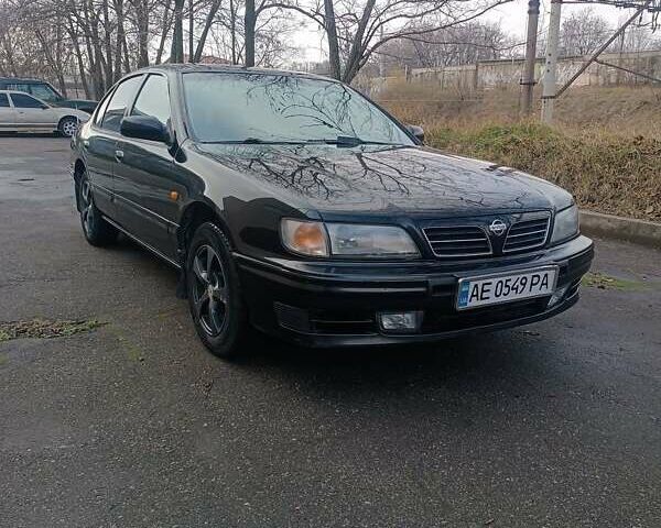 Черный Ниссан Максима, объемом двигателя 2 л и пробегом 291 тыс. км за 2850 $, фото 2 на Automoto.ua