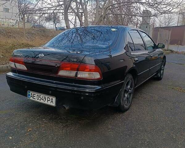 Черный Ниссан Максима, объемом двигателя 2 л и пробегом 291 тыс. км за 2850 $, фото 5 на Automoto.ua