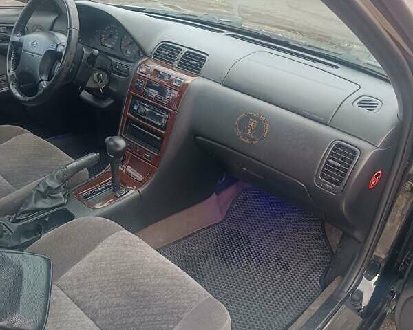 Черный Ниссан Максима, объемом двигателя 2 л и пробегом 291 тыс. км за 2850 $, фото 13 на Automoto.ua