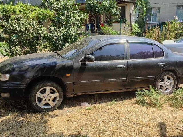 Чорний Ніссан Максіма, об'ємом двигуна 2 л та пробігом 416 тис. км за 1800 $, фото 6 на Automoto.ua